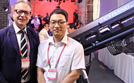 Hwan-Soo Chung of C&C Lightway and Claus Spreyer of Robert Juliat at KOBA 2014. Credit Justin Gawne, Mondiale Publishing.