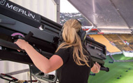 Head Followspot Operator Katie-Jane Bowen and Robert Juliat Merlin in action at the Royal Edinburgh Military Tattoo in Wellington, New Zealand. Photo: © Blair McLaren